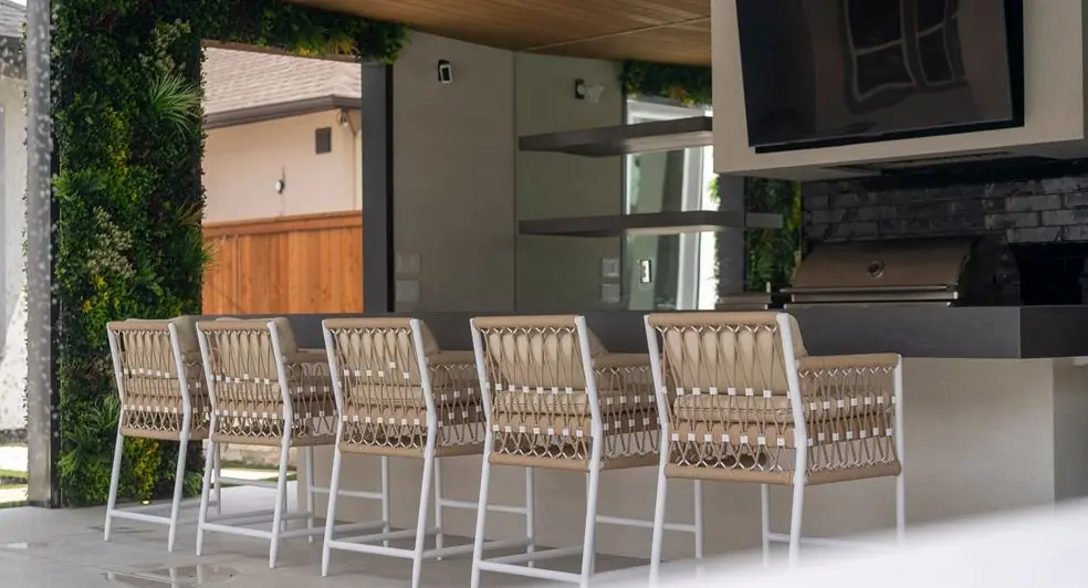 Entertainment area with an outdoor TV and lounge seating